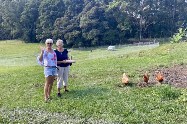 Milli and her mum pay the hens a visit